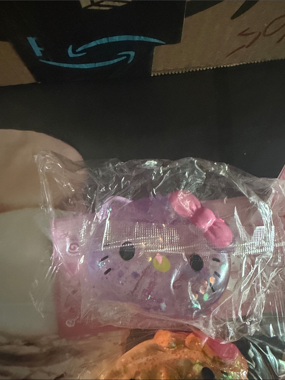 Hello Kitty Purple squishy, pink, orange and green